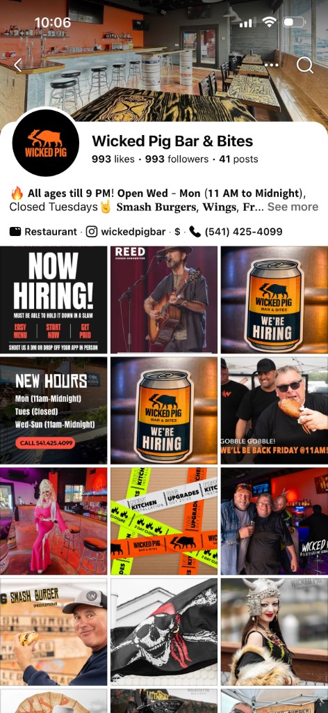 Wicked Pig Bar & Bites &mdash; Instagram profile on phone
